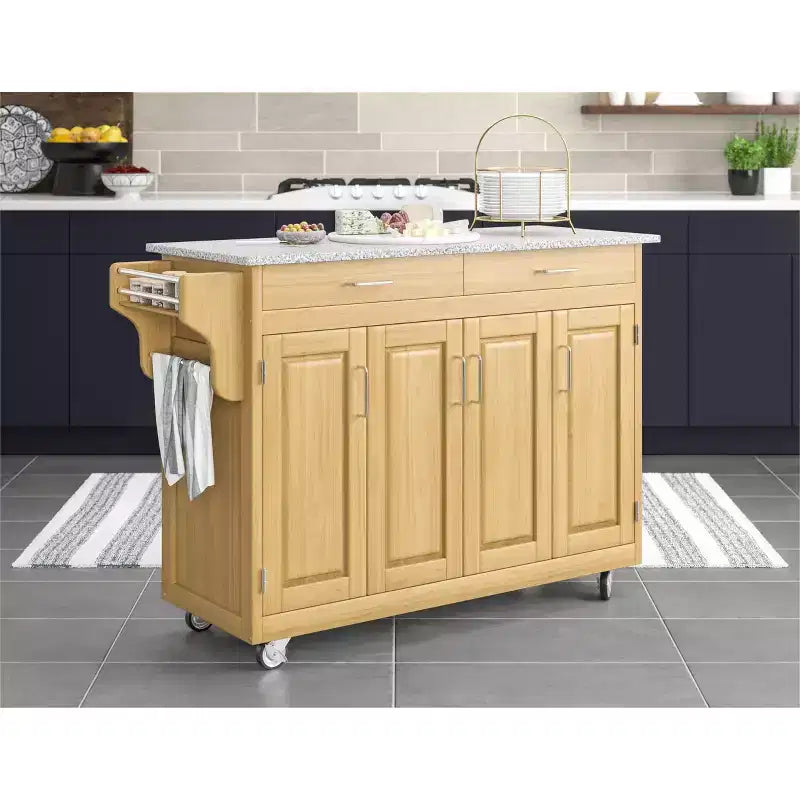 Carrello da cucina in legno naturale tinto con top in granito nero